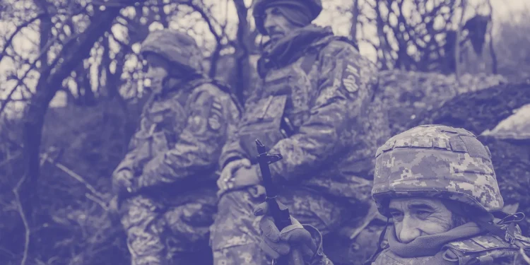 A group of soldiers in military gear. Source photograph by Scott Peterson / Getty Donald Trump assumed office on Monda